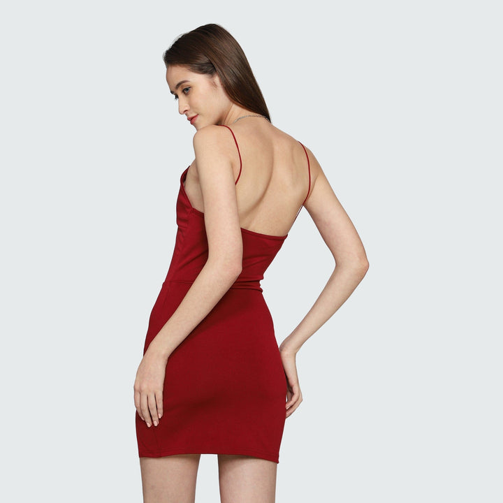 Sexy in strappy maroon mini dress